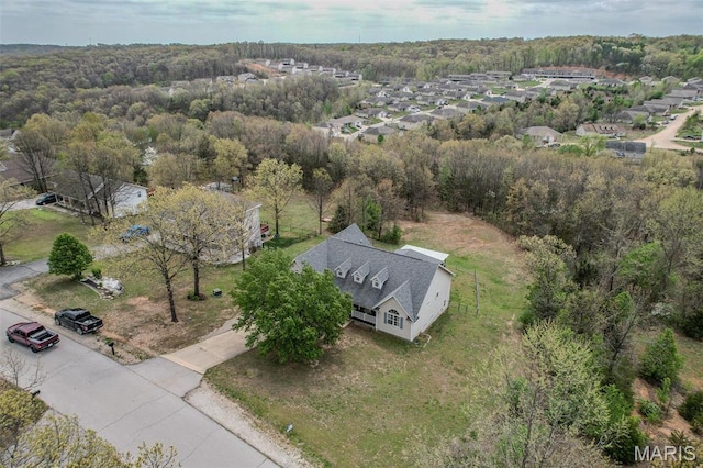 20373 Heritage Rd, Saint Robert, MO 65584 - view of property location with a heavily wooded area