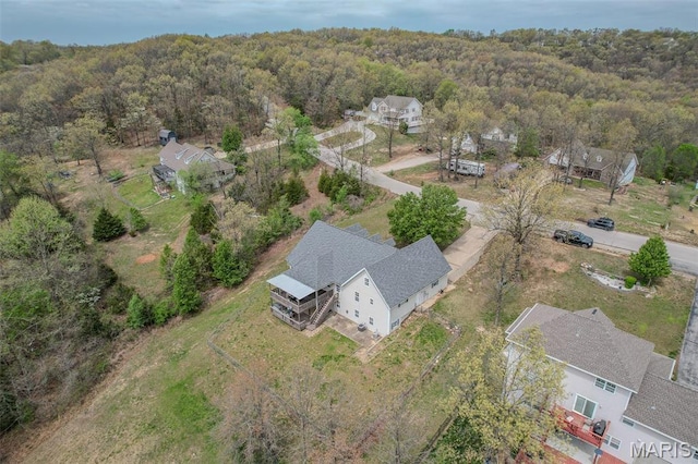 20373 Heritage Rd, Saint Robert, MO 65584 - view from above of property featuring a heavily wooded area