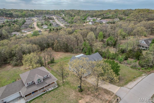 20373 Heritage Rd, Saint Robert, MO 65584 - aerial perspective of suburban area featuring a forest