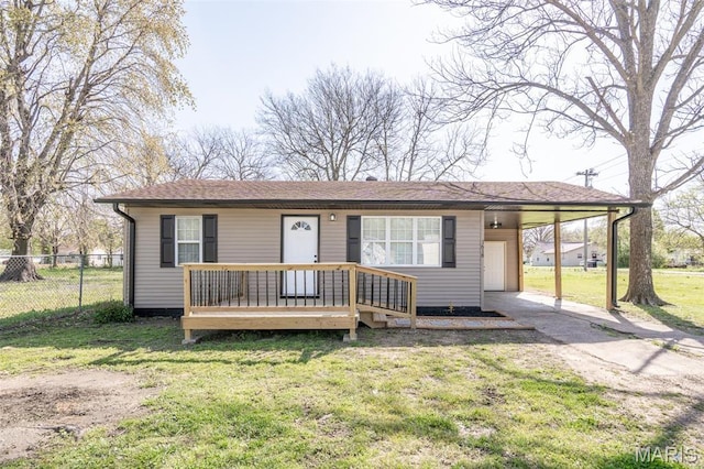 single story home with an attached carport and driveway