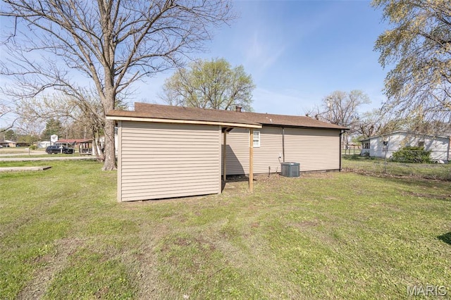 view of outbuilding featuring central air condition unit