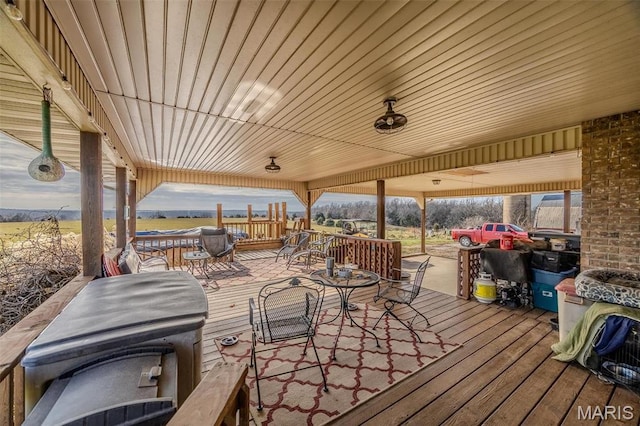 10530 Aspen Rd, Conway, MO 65632 - wooden terrace featuring outdoor dining space