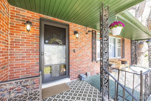 10 Hill Dr, Fairview Heights, IL 62208 - property entrance featuring a porch and brick siding