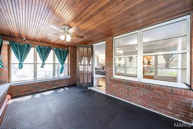 10 Hill Dr, Fairview Heights, IL 62208 - unfurnished sunroom with brick wall, ceiling fan, and wood ceiling