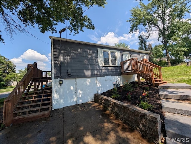 415 Mill St, Bethalto, IL 62010 - view of side of property with stairway and crawl space