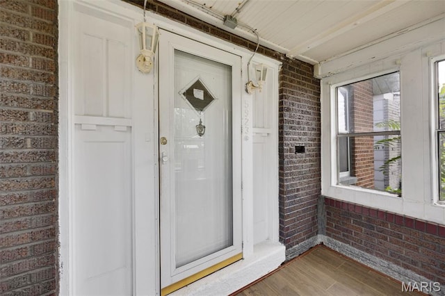 5923 Sherry Ave, Saint Louis, MO 63136 - view of exterior entry featuring brick siding and a porch