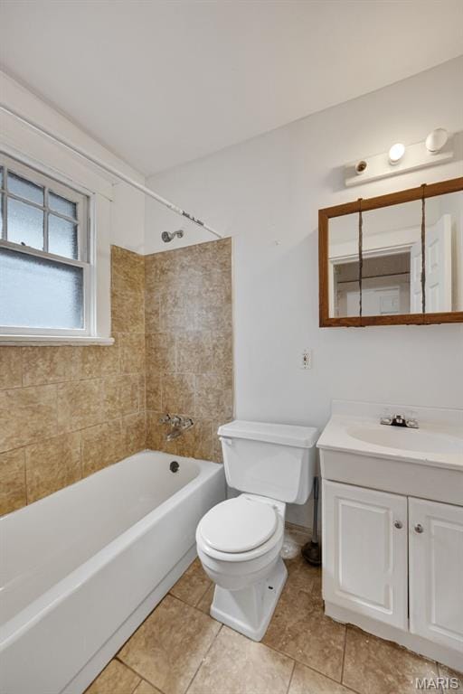 5923 Sherry Ave, Saint Louis, MO 63136 - bathroom featuring vanity, toilet, tub / shower combination, and tile patterned floors