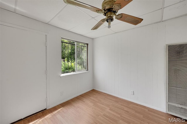 5923 Sherry Ave, Saint Louis, MO 63136 - unfurnished room with a heating unit, light wood-style floors, ceiling fan, and baseboards