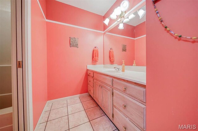 bathroom with vanity and tile patterned floors