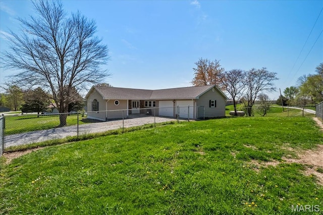 6639 Gladel Dr, Waterloo, IL 62298 - view of side of home featuring driveway, an attached garage, and a fenced backyard