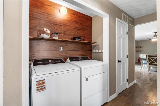 6639 Gladel Dr, Waterloo, IL 62298 - laundry room with washer and dryer, dark wood-type flooring, and a ceiling fan
