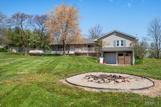 6639 Gladel Dr, Waterloo, IL 62298 - rear view of house featuring a fire pit
