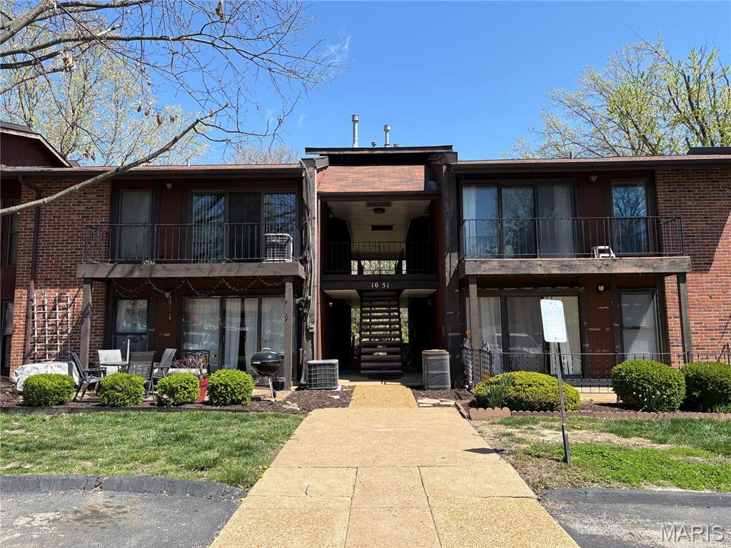 1051 Mersey Bend Dr Unit F, Saint Louis, MO 63129 - view of building exterior featuring central air condition unit