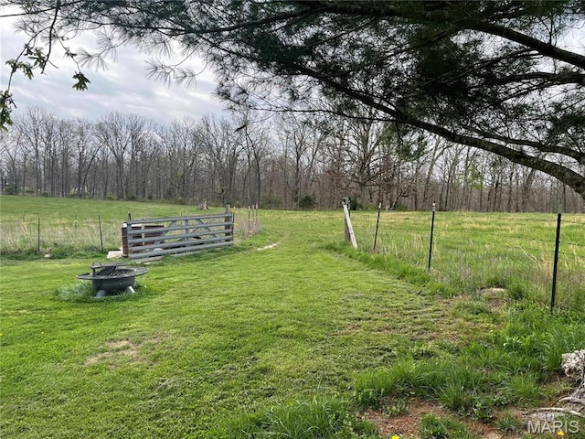 101 County Road 5170, Salem, MO 65560 - view of yard featuring an outdoor fire pit and a wooded view