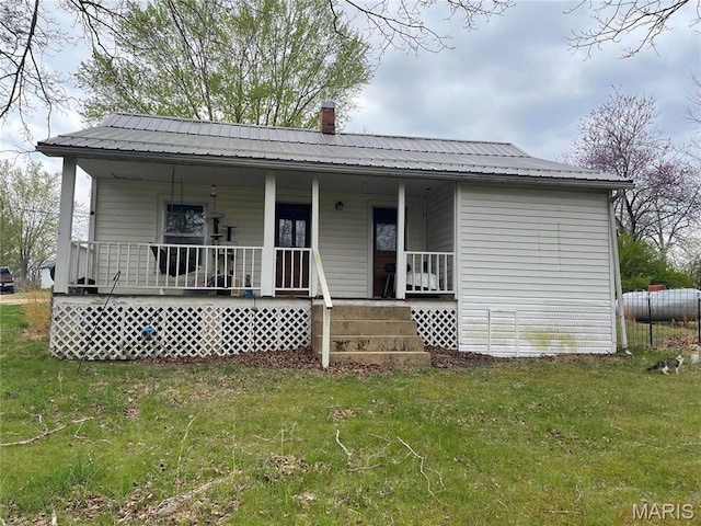 101 County Road 5170, Salem, MO 65560 - view of front of property featuring a porch, metal roof, and a chimney