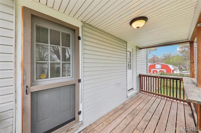 241 Dammert Ave, Saint Louis, MO 63125 - wooden deck with a porch