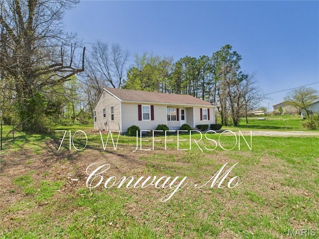 710 W Jefferson Ave, Conway, MO 65632 - ranch-style house with a front lawn