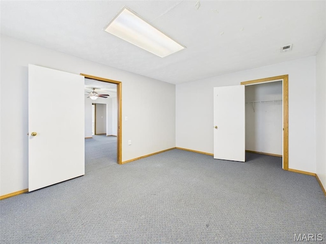 710 W Jefferson Ave, Conway, MO 65632 - unfurnished bedroom with baseboards, carpet, and a closet
