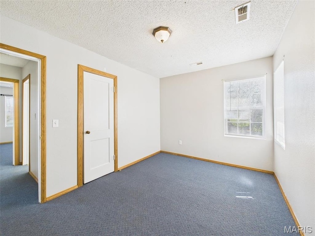 710 W Jefferson Ave, Conway, MO 65632 - unfurnished room featuring carpet floors and baseboards