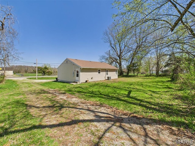 710 W Jefferson Ave, Conway, MO 65632 - view of side of home featuring a lawn and cooling unit