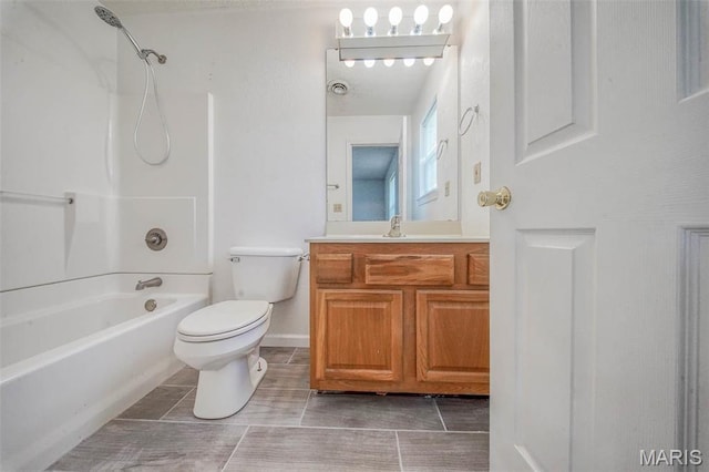 full bathroom featuring toilet, shower / bathtub combination, and vanity