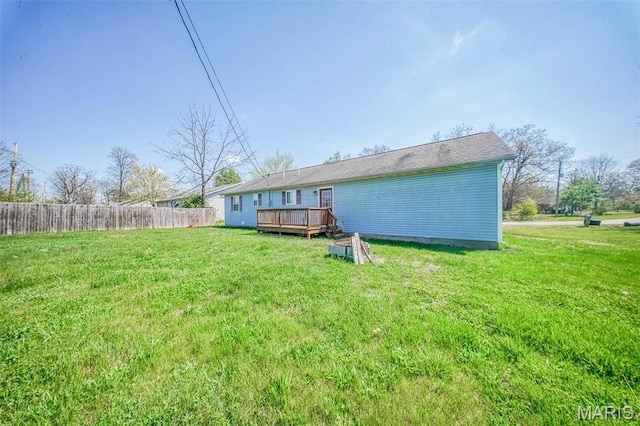 back of property with a deck
