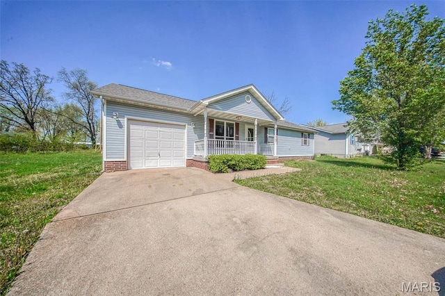 single story home featuring covered porch, a garage, driveway, and a front lawn