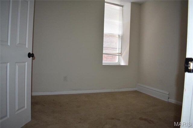 2912 Indiana Ave, Saint Louis, MO 63118 - unfurnished room with carpet floors and baseboards