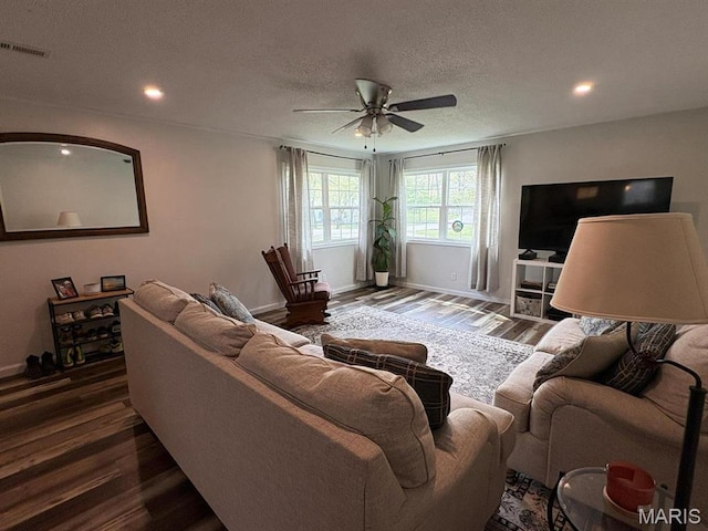10817 Cabin Ln, Dexter, MO 63841 - living room with a ceiling fan, wood finished floors, baseboards, recessed lighting, and a textured ceiling