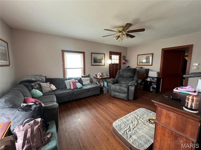 1714 Price St, Hannibal, MO 63401 - living area with ceiling fan and wood finished floors