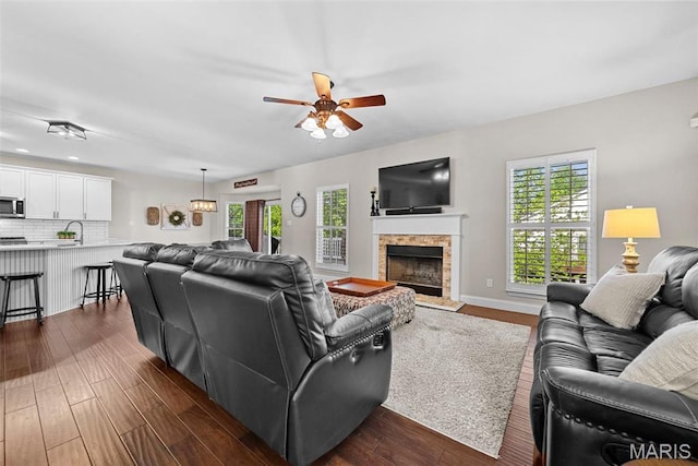 515 Country Chase Dr, Lake St Louis, MO 63367 - living room featuring healthy amount of natural light, ceiling fan, dark wood finished floors, a stone fireplace, and recessed lighting