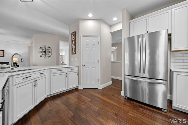 515 Country Chase Dr, Lake St Louis, MO 63367 - kitchen with freestanding refrigerator, a sink, light countertops, white cabinetry, and recessed lighting