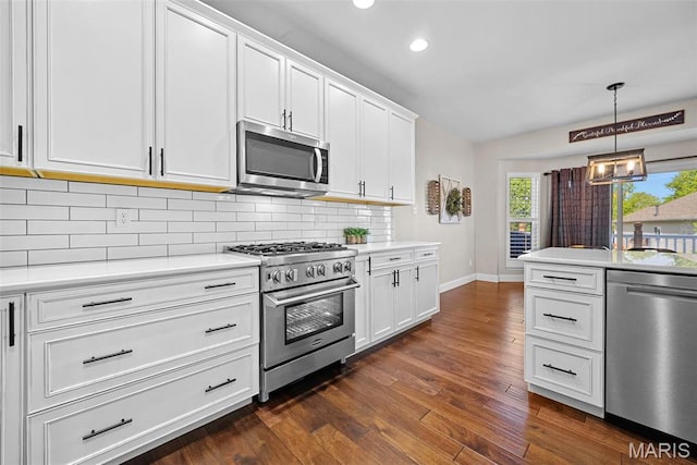 515 Country Chase Dr, Lake St Louis, MO 63367 - kitchen featuring appliances with stainless steel finishes, light countertops, backsplash, baseboards, and dark wood finished floors