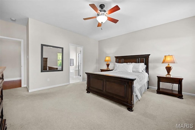 515 Country Chase Dr, Lake St Louis, MO 63367 - bedroom with light colored carpet, baseboards, ensuite bath, and ceiling fan