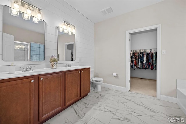 515 Country Chase Dr, Lake St Louis, MO 63367 - full bath featuring marble finish flooring, a garden tub, baseboards, a stall shower, and double vanity