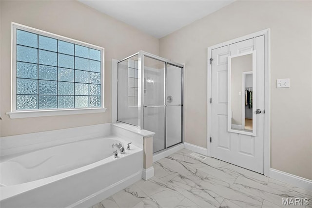 515 Country Chase Dr, Lake St Louis, MO 63367 - full bathroom featuring marble finish floors, a bath, a shower stall, and baseboards