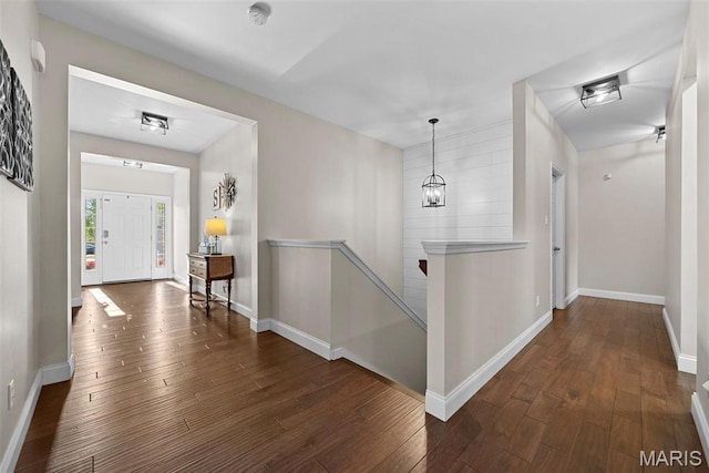 515 Country Chase Dr, Lake St Louis, MO 63367 - entryway with baseboards and dark wood finished floors