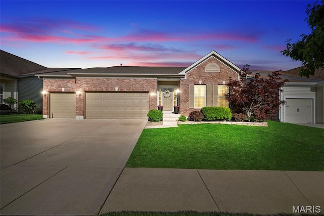 515 Country Chase Dr, Lake St Louis, MO 63367 - single story home with a garage, a yard, brick siding, and driveway