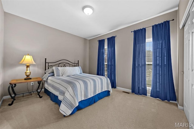 515 Country Chase Dr, Lake St Louis, MO 63367 - carpeted bedroom with baseboards and a closet