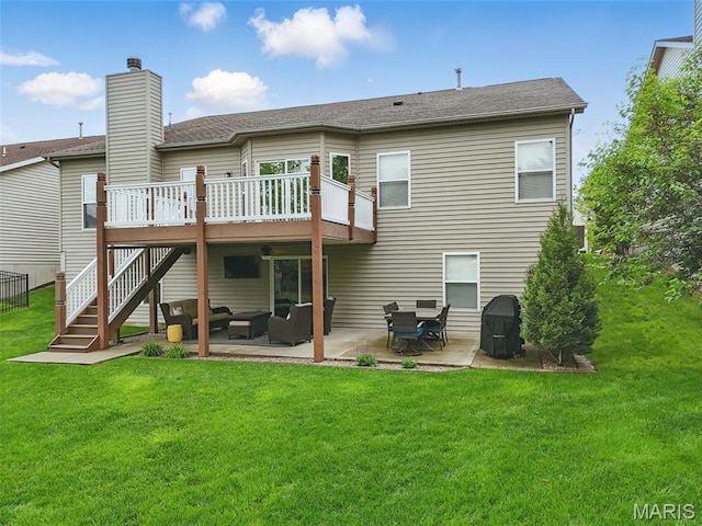 515 Country Chase Dr, Lake St Louis, MO 63367 - back of house with an outdoor living space, a wooden deck, a patio area, a lawn, and a chimney