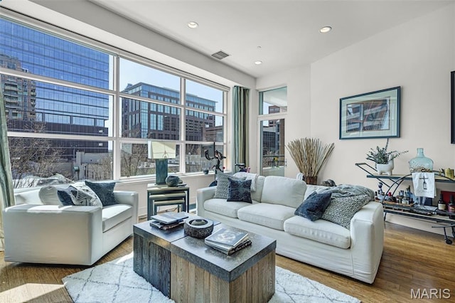 8025 Maryland Ave Unit 2H, Saint Louis, MO 63105 - living area with recessed lighting and wood finished floors