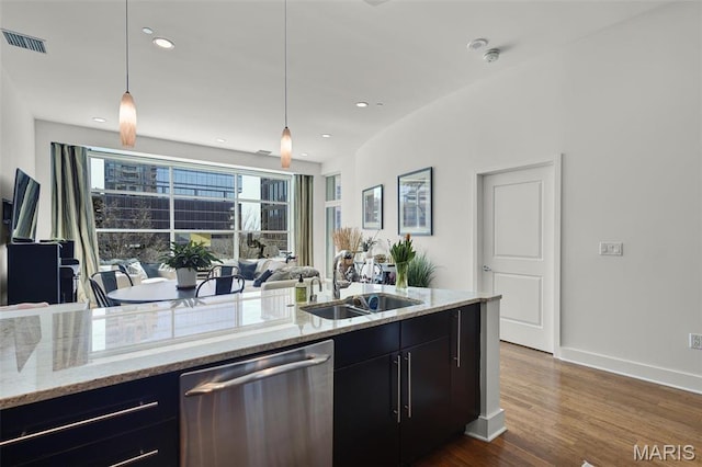 8025 Maryland Ave Unit 2H, Saint Louis, MO 63105 - kitchen featuring stainless steel dishwasher, a sink, open floor plan, dark cabinetry, and dark wood-style floors