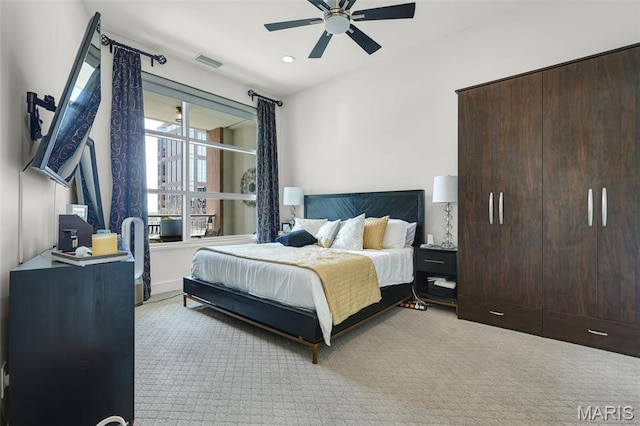 8025 Maryland Ave Unit 2H, Saint Louis, MO 63105 - carpeted bedroom with ceiling fan and recessed lighting