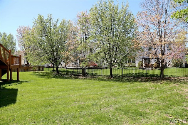 view of yard with a deck
