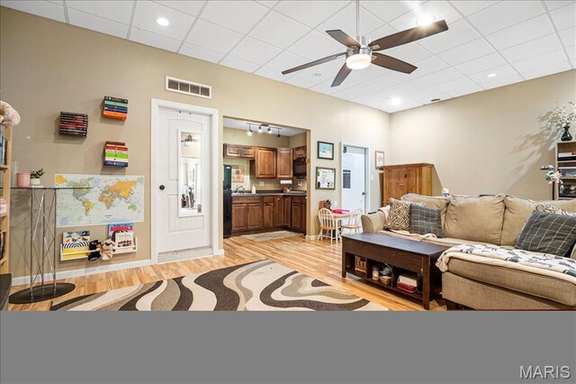 1909 Shepard Rd, Wildwood, MO 63038 - living area featuring ceiling fan and light wood-type flooring