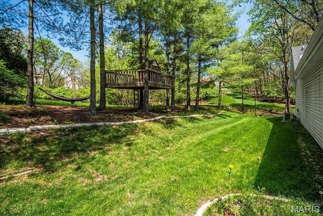 1909 Shepard Rd, Wildwood, MO 63038 - view of green lawn with a wooden deck