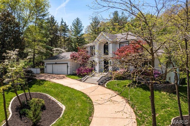 1909 Shepard Rd, Wildwood, MO 63038 - view of front facade featuring a front lawn and driveway
