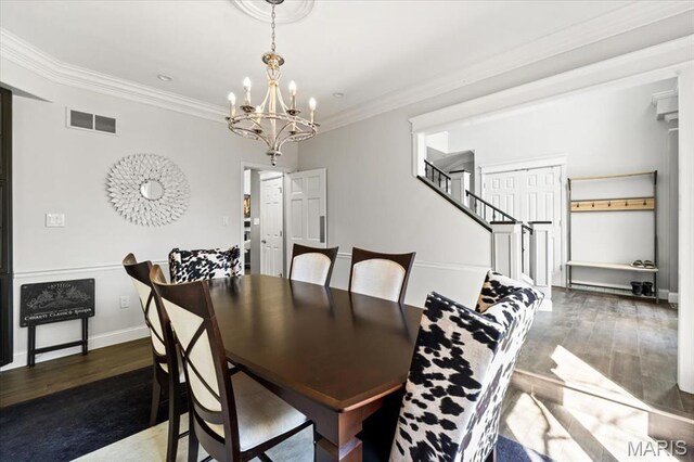 1909 Shepard Rd, Wildwood, MO 63038 - dining room featuring a chandelier, wood finished floors, crown molding, stairs, and baseboards