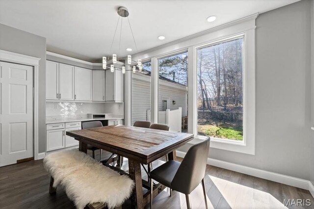 1909 Shepard Rd, Wildwood, MO 63038 - dining area with healthy amount of natural light, a chandelier, baseboards, dark wood-type flooring, and recessed lighting