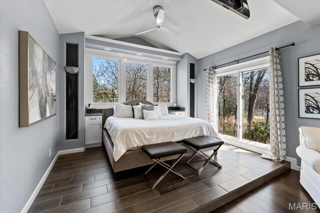 1909 Shepard Rd, Wildwood, MO 63038 - bedroom featuring lofted ceiling, multiple windows, baseboards, dark wood-style flooring, and a ceiling fan